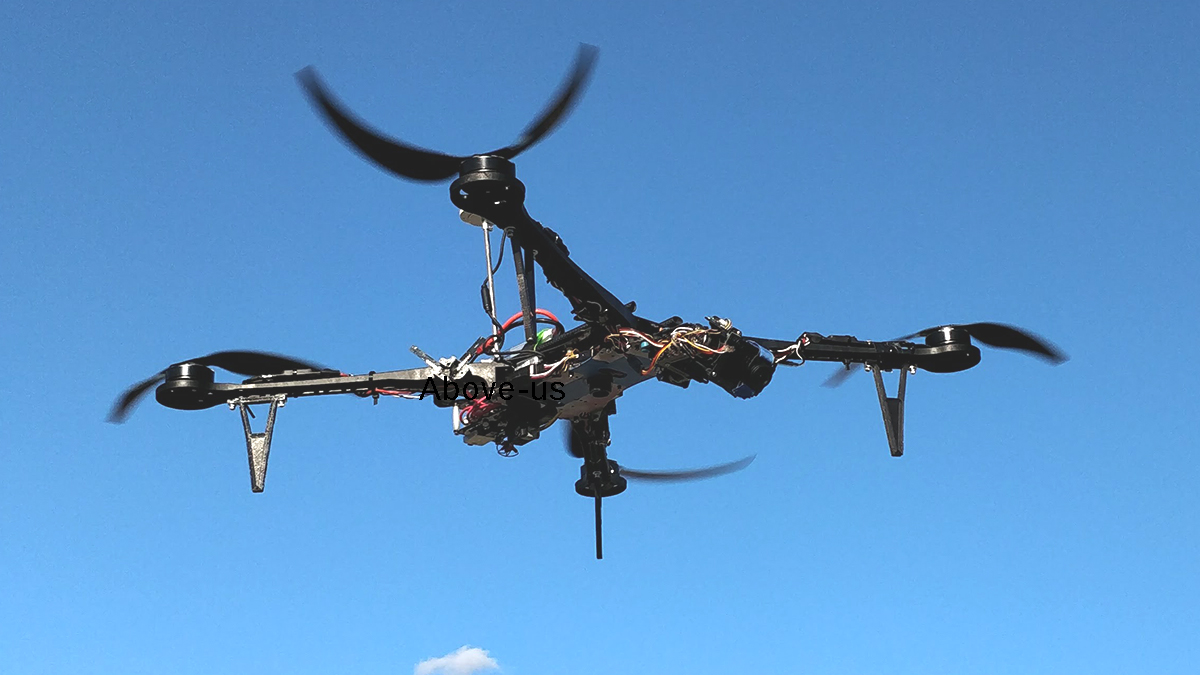 a large quadcopter drone flying in the air