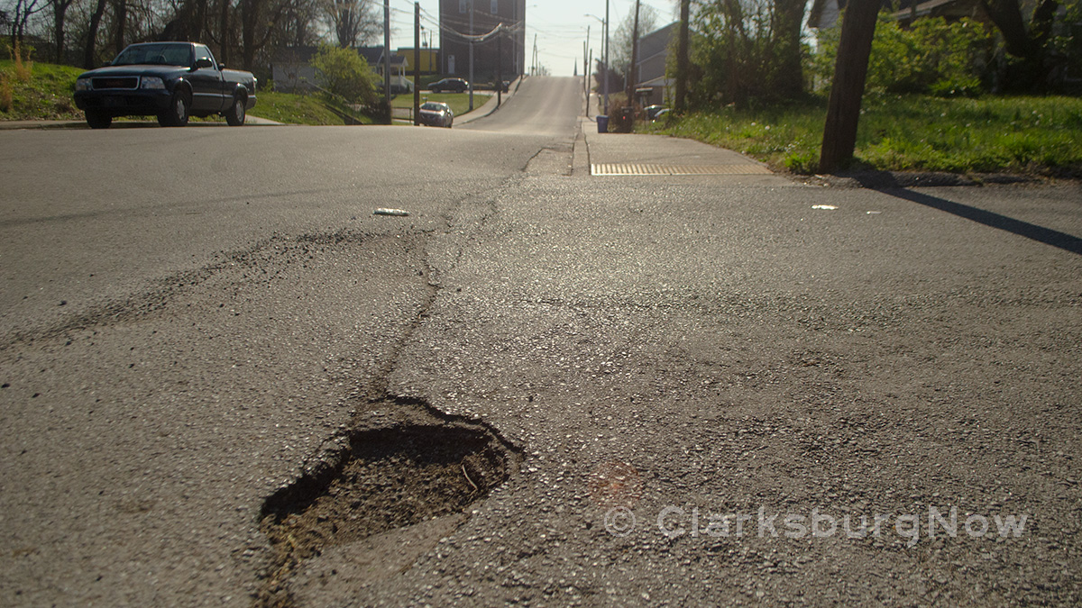 A pothole in downtown Clarksville